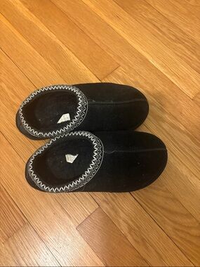 UGG Black Slip-On Moccasin Slippers with White Whipstitch